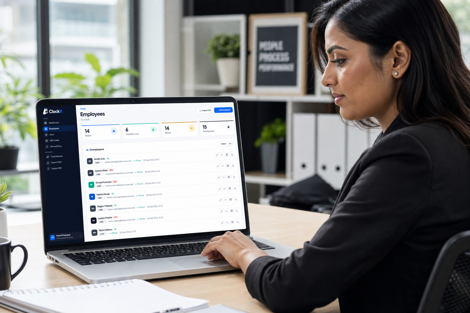 Ops manager reviewing the ClockIt employee roster